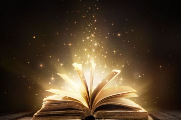 Magic book with shining lights