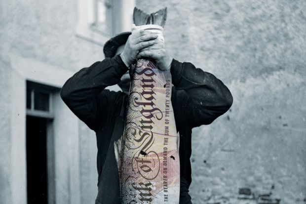 Man holding big fish with UK bank note projected
