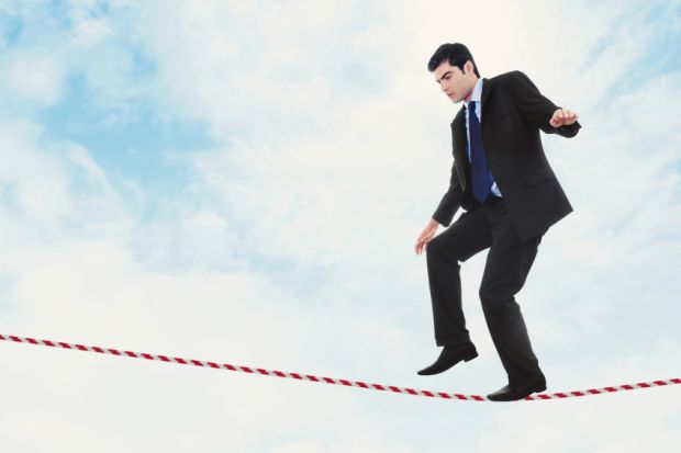 Man walking on tightrope Man walking on tightrope