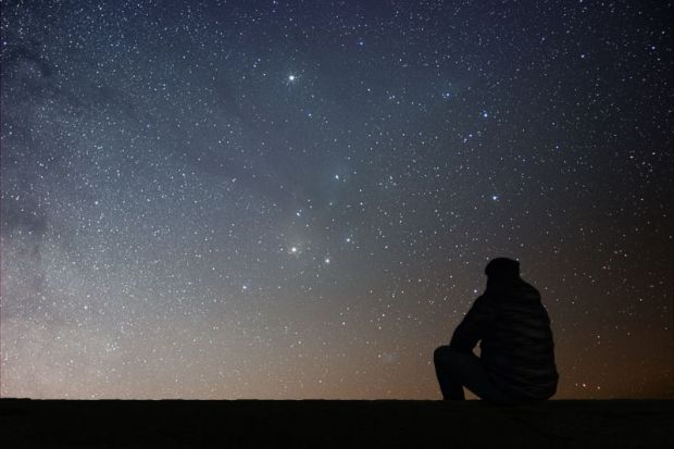 Man looking at the stars
