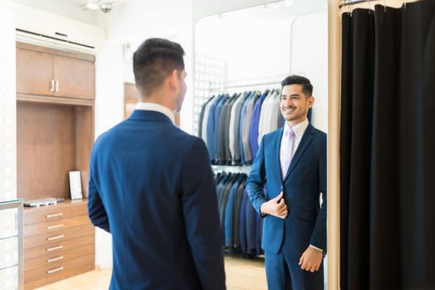 Man satisfied with new suit