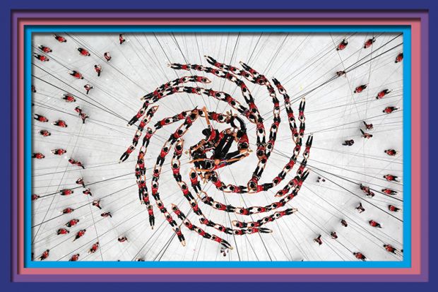 Students from Tagou martial arts school performing during a rehearsal of the opening ceremony of the Youth Olympic Games in Nanjing, China. As an illustration of whether there is stagnation in Asian universities climbing to the top of the rankings.