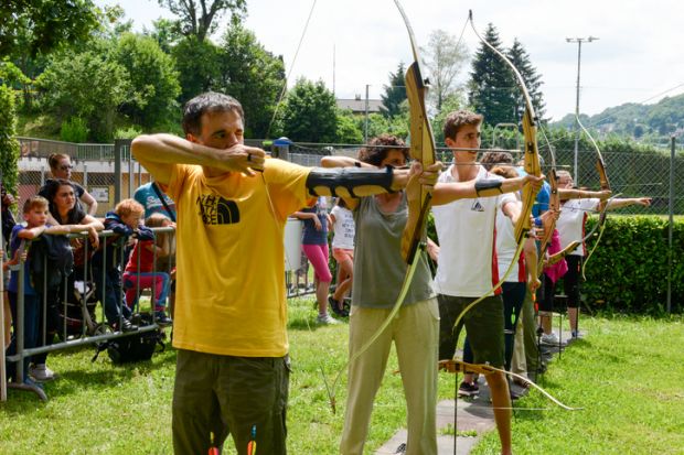 Massagno, Switzerland - 13 June 2016 - people who are learning to archery at Massagno on the italian part of Switzerland