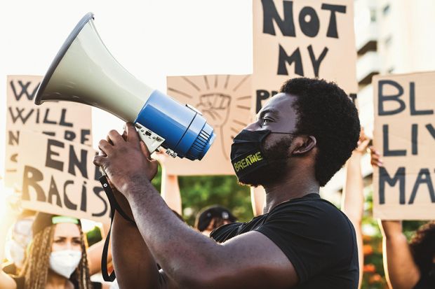 Activist movement protesting against racism and fighting for equality, Black Lives Matter - Demonstrators from different cultures and race protest on street - universities urged to take a stand on issues