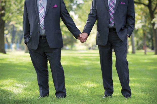 Men holding hands, same sex marriage