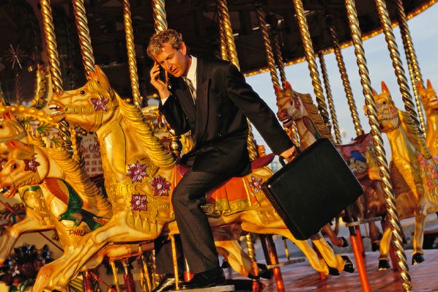 Man wearing a suit on a merry-go-round