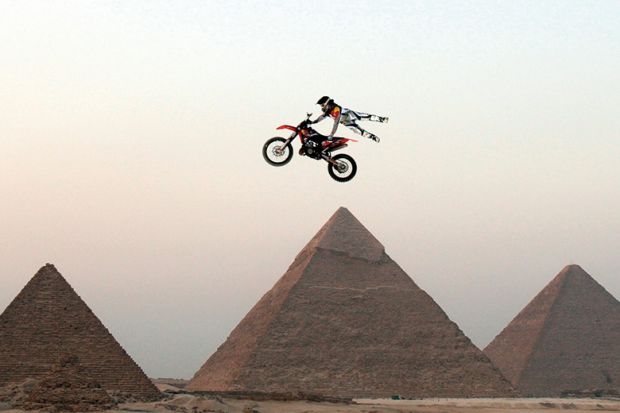 Motorbike jumping the pyramids