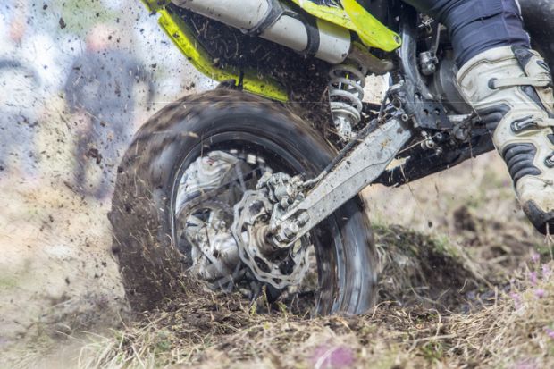 A motorbike stuck in the mud A motorbike stuck in the mud