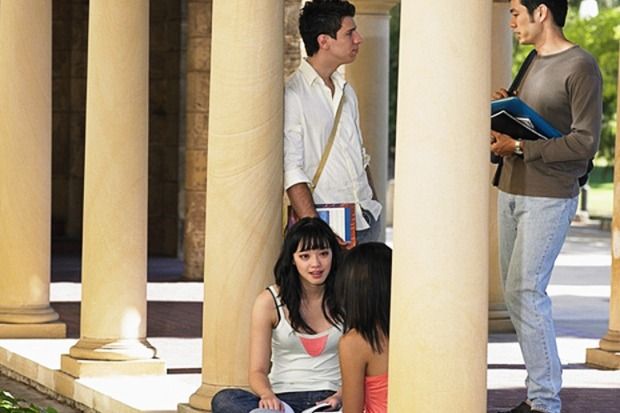 A group of multi-ethnic students in a colonnade, symbolising international civic mission A group of multi-ethnic students in a colonnade, symbolising international civic mission