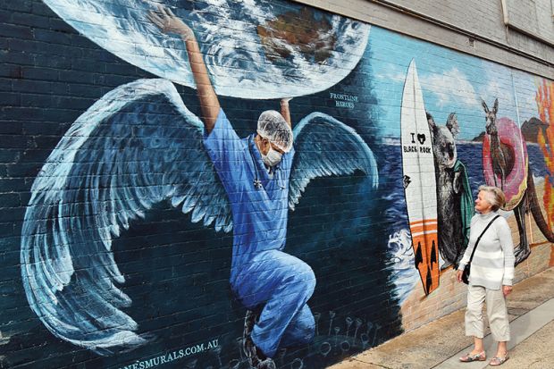 Mural of a winged healthcare worker with Australian animals