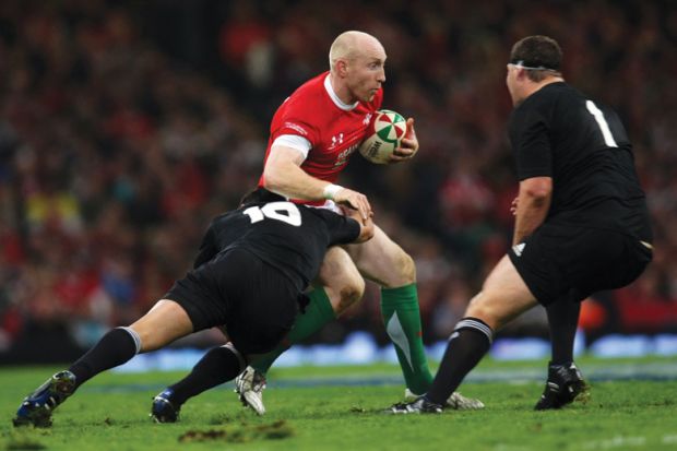 New Zealand All Black's tackle New Zealand All Black's tackle