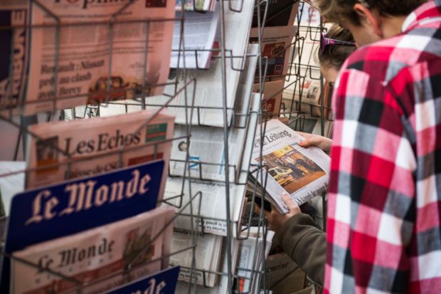 newspaper-kiosk-in-paris-day-after-terrorist-attacks-in-november-2015