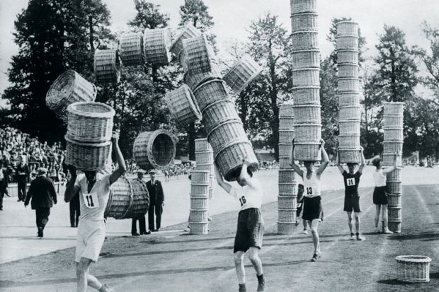 People taking part in basket carrying contest, London