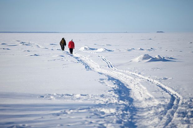 People walking through snow People walking through snow