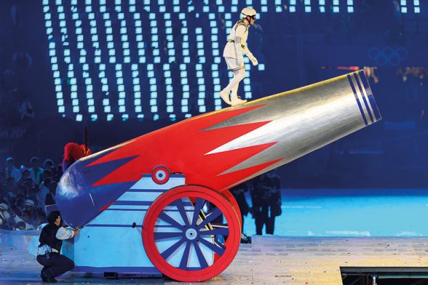 Person preparing to be fired from cannon