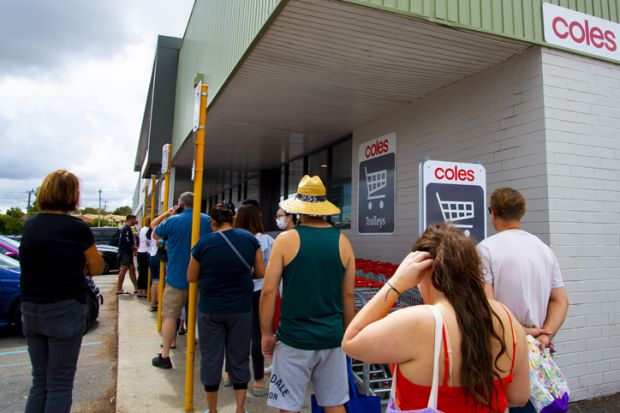Perth, Australia - March 15, 2020 People queuing at Coles grocery store during the Coronavirus crisis