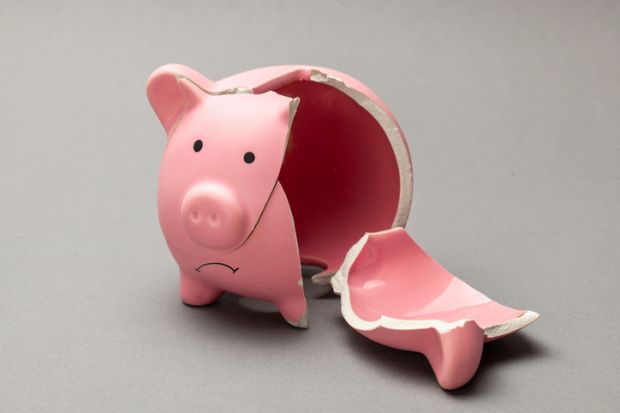 A broken piggy bank, symbolising in adequate master's loans