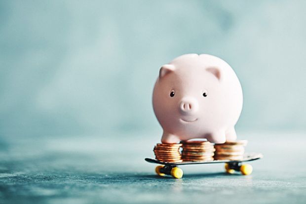 A piggy bank on a skateboard, illustrating funding imagination