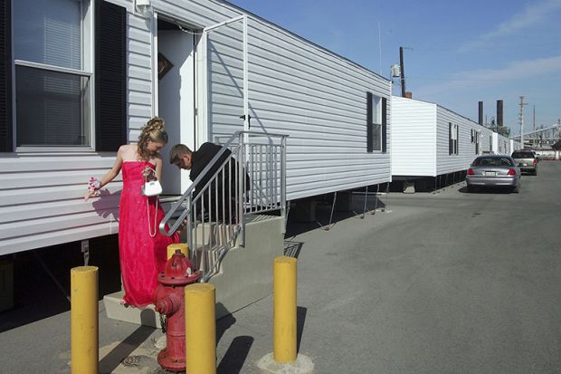 A couple leave a temporary trailer for their high school prom in Chalmette, Louisiana. To illustrate that universities in the USA may need to adapt for non-traditional students in order to tackle the enrolment cliff. A couple leave a temporary trailer for their high school prom in Chalmette, Louisiana. To illustrate that universities in the USA may need to adapt for non-traditional students in order to tackle the enrolment cliff.