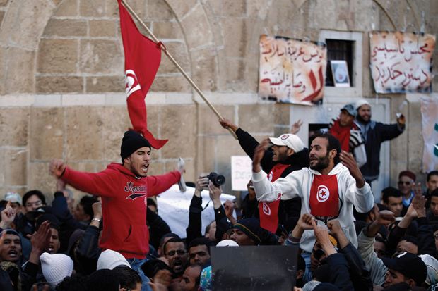 Protesters outside the Tunisian prime minister’s office in Tunis in 2011