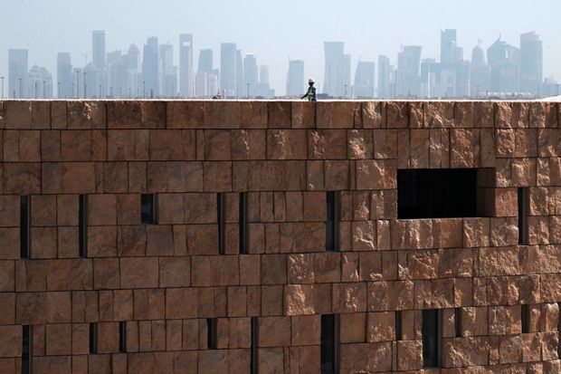 Doha skyline is a backdrop for Northwestern University in Qatar on the Education City campus in Doha, Qatar