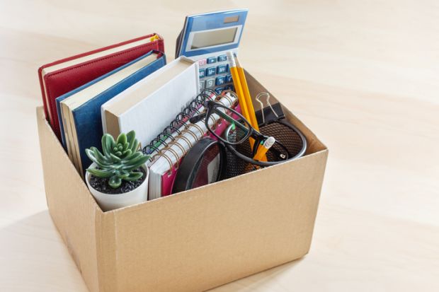 A cardboard box containing a quitting worker's belongings