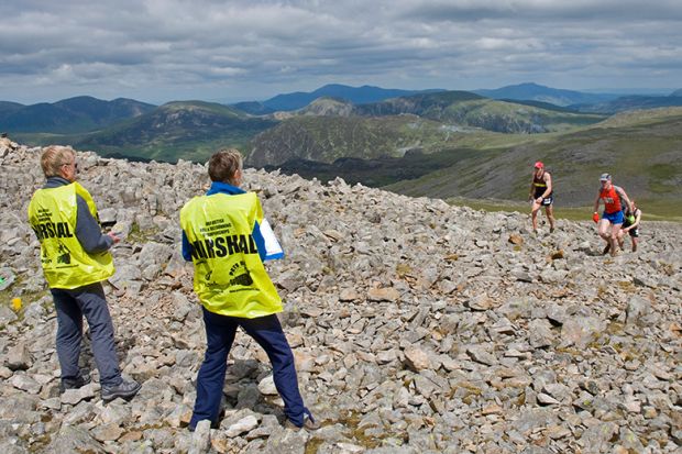 Fell runners arriving at a checkpoint on Kirk Fell, during the Ennerdale Fell Race, Lake District. To illustrate marking a student’s distance travelled, rather than judging them solely on the absolute quality of a final output. Fell runners arriving at a checkpoint on Kirk Fell, during the Ennerdale Fell Race, Lake District. To illustrate marking a student’s distance travelled, rather than judging them solely on the absolute quality of a final output.