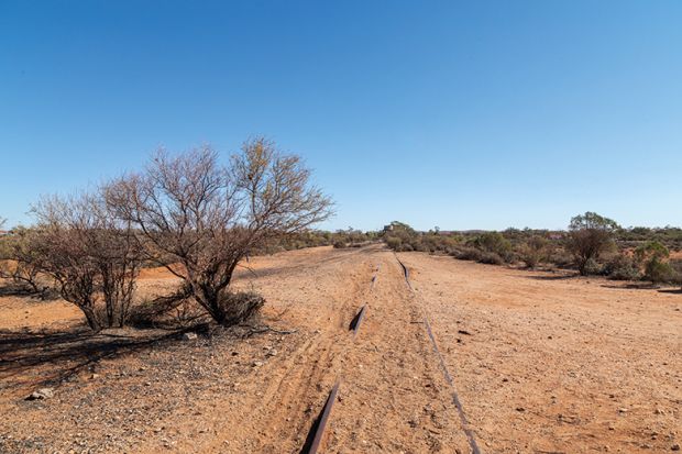 Did Australia ride the intern ational gravy train too far? Railway line in Australian outback
