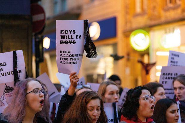 Students take part in a sexual consent protest on Cornmarket Street in Oxford