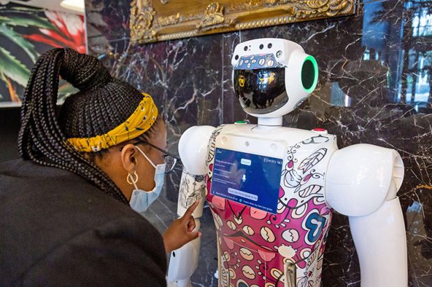 A woman interacts with robot in Johannesburg, South Africa. To illustrate that Africa has a crucial role in advancing the study of AI. A woman interacts with robot in Johannesburg, South Africa. To illustrate that Africa has a crucial role in advancing the study of AI.