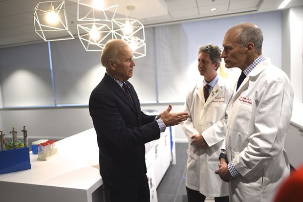 Joe Biden (L) meets with (C-R) Dr. Bruce Levine and Dr. Carl June, while touring the University of Pennsylvania, Perelman School of Medicine and Abramson Cancer Center in Philadelphia, Pennsylvania January 15, 2016. Joe Biden (L) meets with (C-R) Dr. Bruce Levine and Dr. Carl June, while touring the University of Pennsylvania, Perelman School of Medicine and Abramson Cancer Center in Philadelphia, Pennsylvania January 15, 2016.