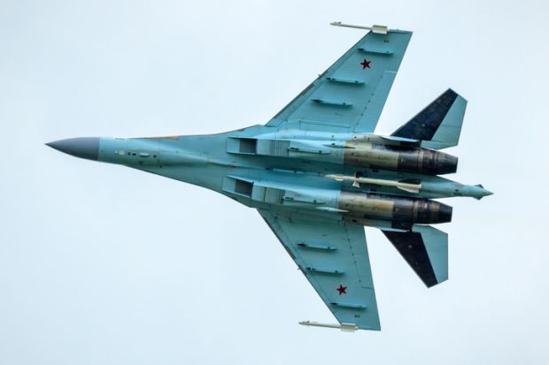 Russian Air Force plane Sukhoi Su-35 flies in sky, Russia