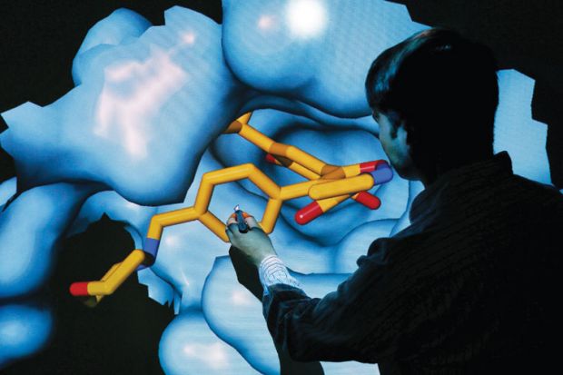 Scientist Nathan Brown moves 3D model of HSP90 protein