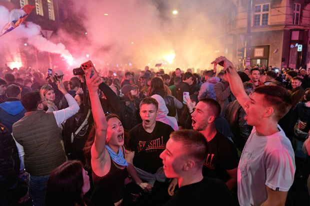 Supporters of the Student List Students Win opposition movement celebrate following former Serbian President Aleksandar Vucic 's concession of defeat on 25 October, 2026 in Belgrade, Serbia. Supporters of the Student List Students Win opposition movement celebrate following former Serbian President Aleksandar Vucic 's concession of defeat on 25 October, 2026 in Belgrade, Serbia.