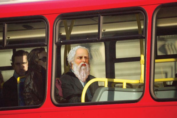 Socrates sitting on top deck of London bus