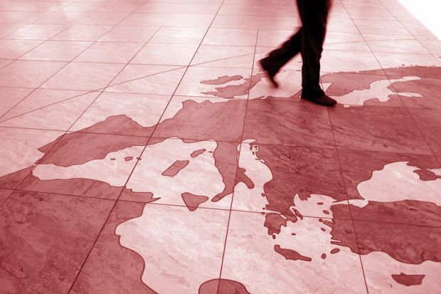 Business executive walking over Europe map on airport floor to illustrate UK warned of ‘exodus’ of research talent as ERC clock ticks