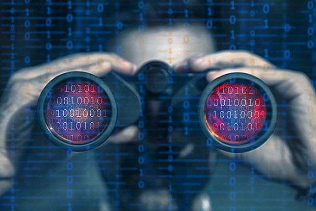 Someone looks through binoculars with binary code in the lenses Someone looks through binoculars with binary code in the lenses