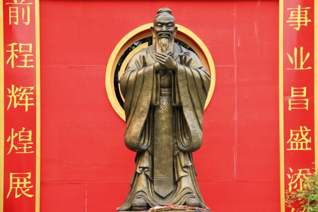 statue of confucius in chinatowns wat traimet bangkok thailand