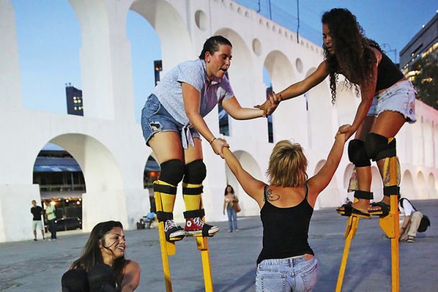 Group of women on stilts
