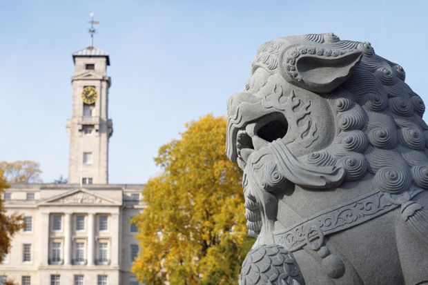 Stone lion in front of Nottingham University's Trent Building