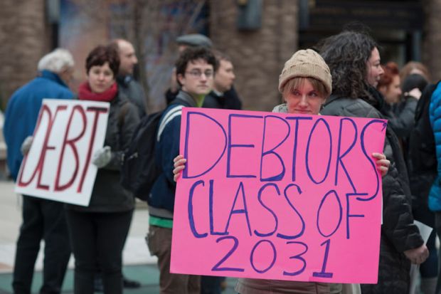 Student demonstrators holding 'Debtors class of 2031' sign