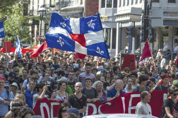 Student protesters marching through streets of Montreal