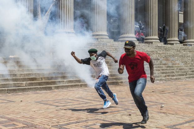 Students running during protest, University of the Witwatersrand