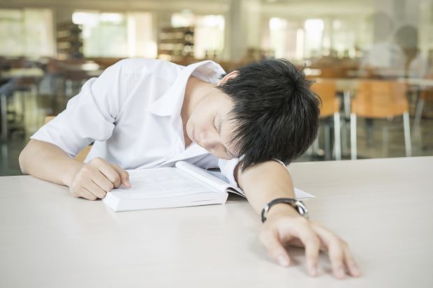 Student sleeping on desk