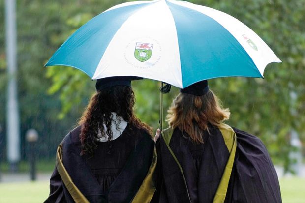 Students under an umbrella