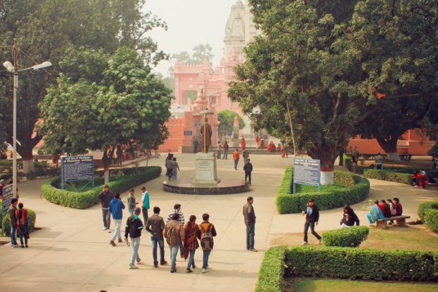 Students go to campus through the park of Bannares Hindu University