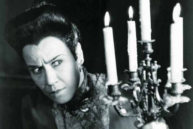 Suspicious woman holding candles Suspicious woman holding candles