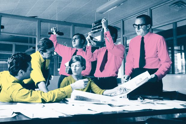 Editors having a discussion around a table