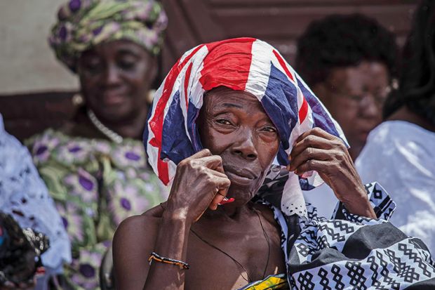 African person with British flag on their head