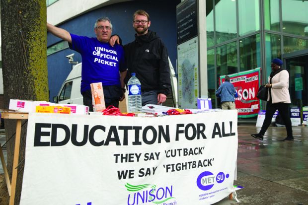 Max Watson (R), UNISON National Executive Council and London Metropolitan University UNISON Branch Secretary, with a fellow union member on the picket line outside London Metropolitan University